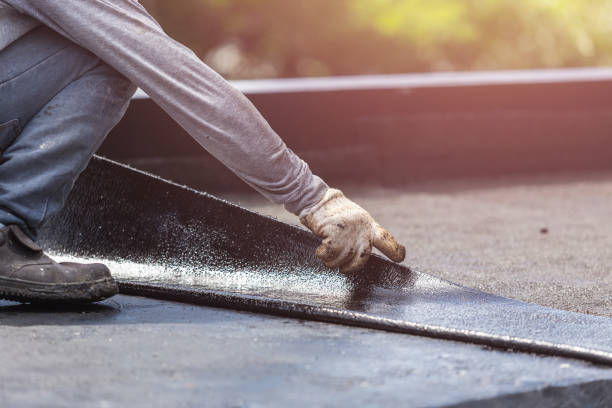 Professional Waterproofing technician working in Appleton, NY